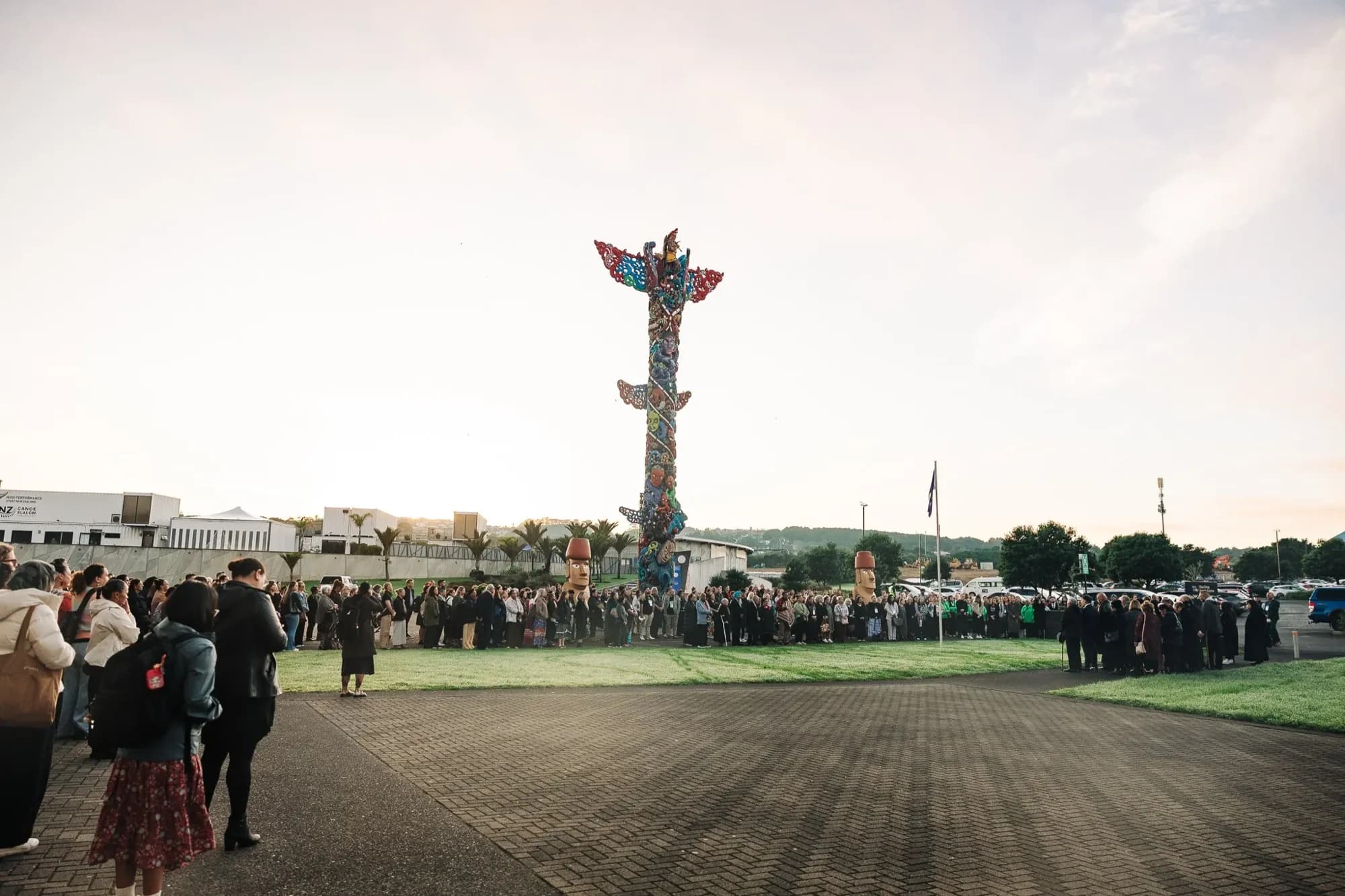 The pōwhiri at Pou Kapua at dawn, World Indigenous Cancer Conference, Tāmaki Makaurau, April 2026